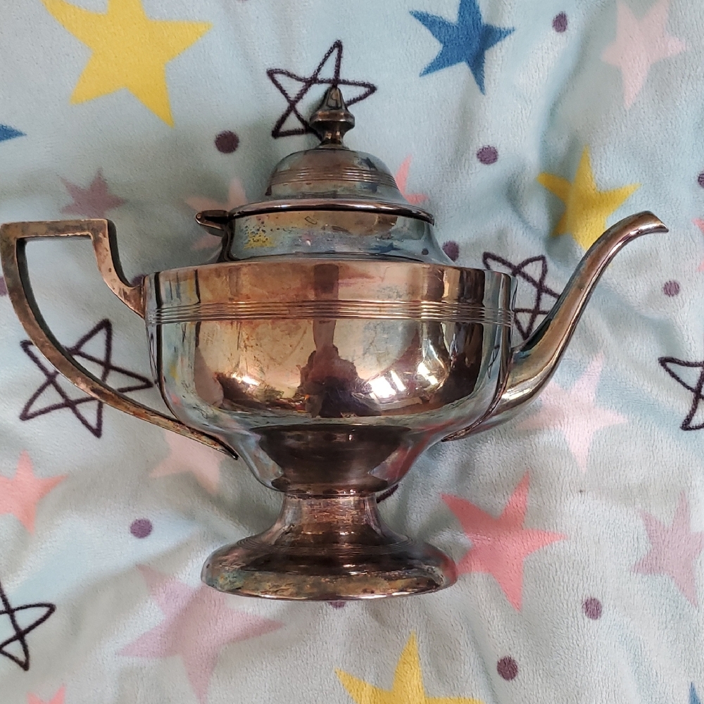 Vintage Silver Teapot with Elegant Design
